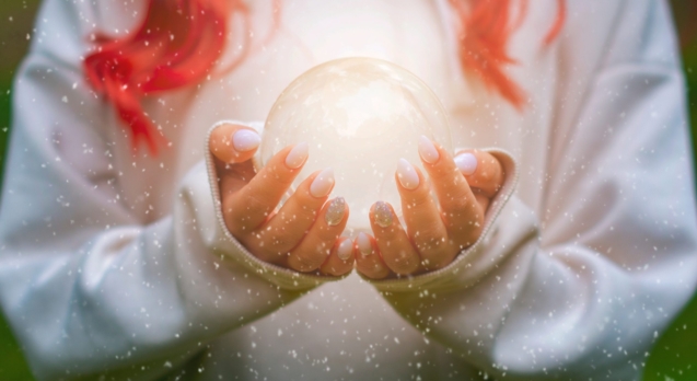 magical-fairy-mystical-crystal-ball-in-the-hands-o-52YFPGP